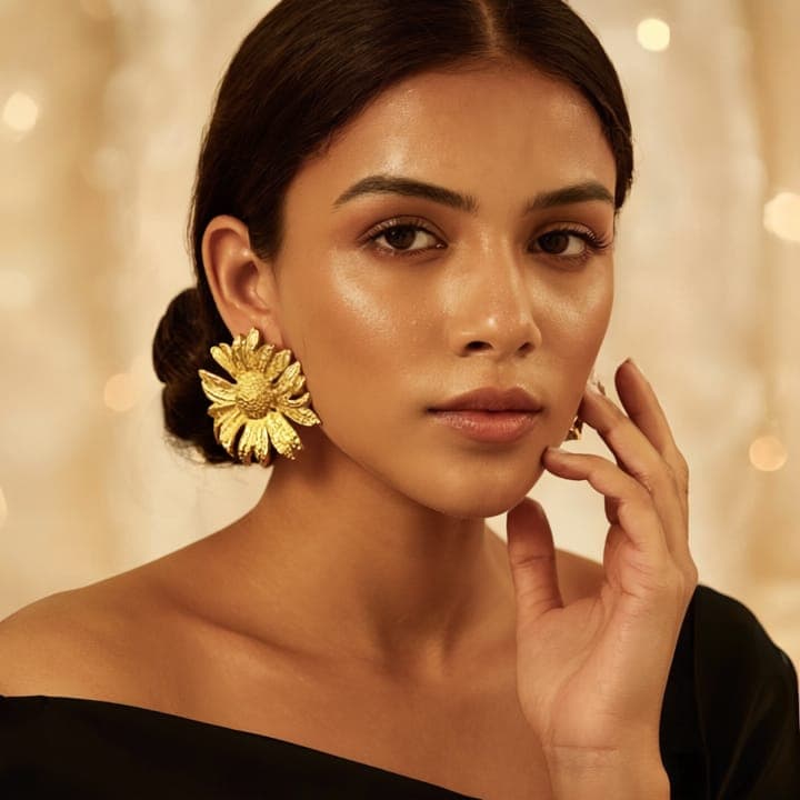 Everyday handcrafted Ushve jewellery arranged on a neutral surface